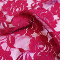 A swirled sample of Ada Stretch Lace in the color merlot.
