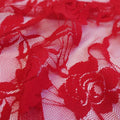 A swirled sample of Ada Stretch Lace in the color red.