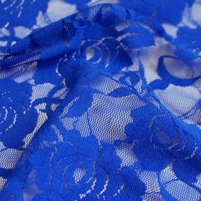 A swirled sample of Ada Stretch Lace in the color Royal.