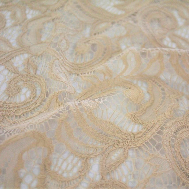 A flat sample of Adelaide stretch lace in the color skin..