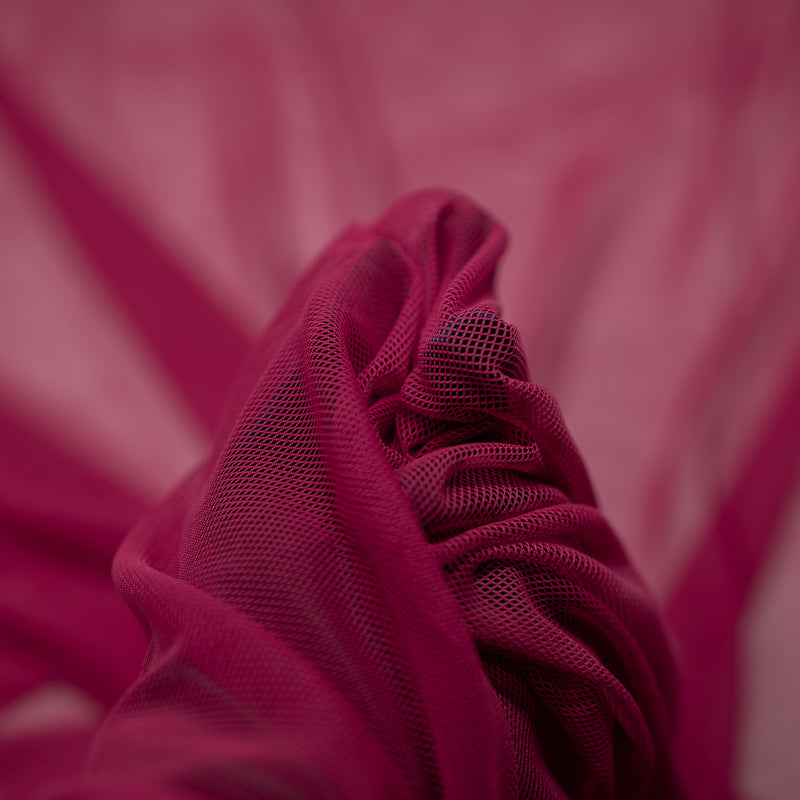 Detailed shot of Annette Stretch Mesh in color Fuchsia.