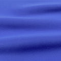 A ruffled sample of Antimicrobial Neoprene in the color royal.