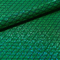 A folded sample of argyle shattered glass foiled spandex in the color green.