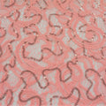 A flat sample of ashley stretch lace sequin in the color pink.