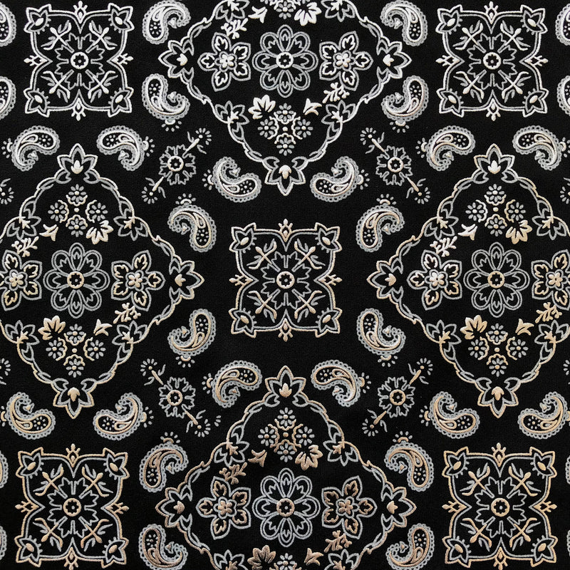 A flat sample of bandana foil printed spandex in the color black-silver.
