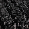 A sample of barbarella knitted lace sequin in the color black.