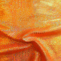 A swirled piece of Beach Ball Foiled Spandex in the color neon orange.
