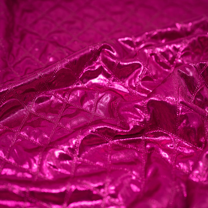 A crumpled piece of Betty Embossed Metallic Polyester in Fuchsia.