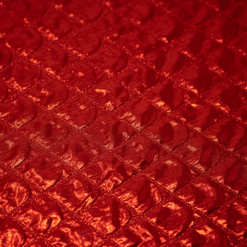 Detailed shot of Betty Embossed Metallic Polyester in Red.