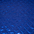 Detailed shot of Betty Embossed Metallic Polyester in Royal.