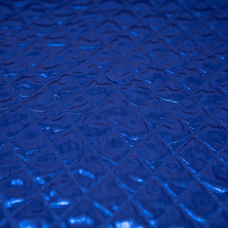 Detailed shot of Betty Embossed Metallic Polyester in Royal.