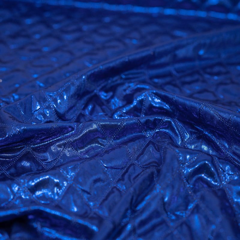 A crumpled piece of Betty Embossed Metallic Polyester in Royal.