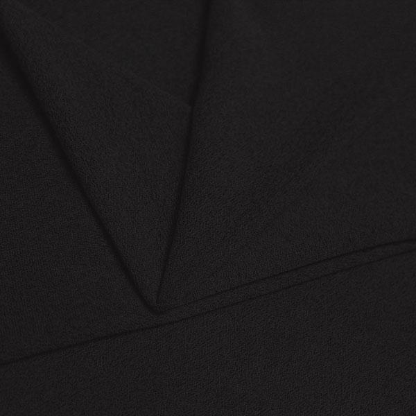 A folded piece of Blast Textured Spandex in black