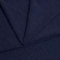 A folded piece of Blast Textured Spandex in navy.