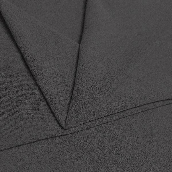 A folded piece of Blast Textured Spandex in slate grey.