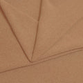 A folded piece of Blast Textured Spandex in Fawn
