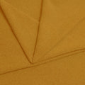 A folded piece of Blast Textured Spandex in Honey