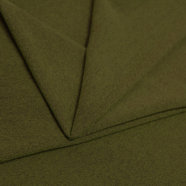 A folded piece of Blast Textured Spandex in Sepia