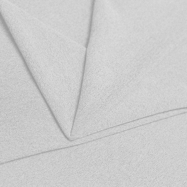 A folded piece of Blast Textured Spandex in white.