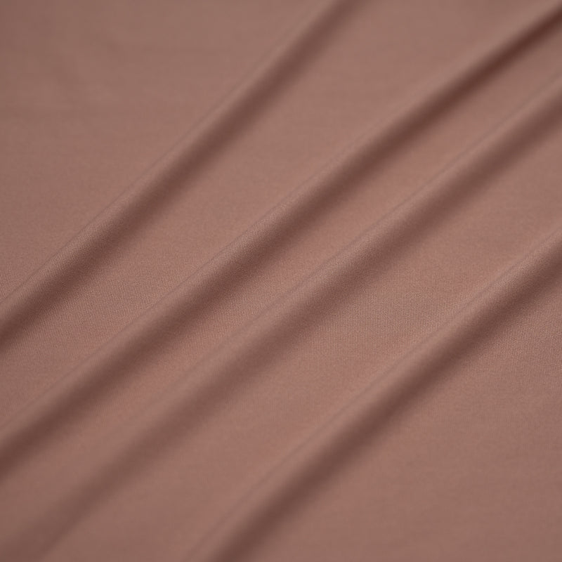 A sample of Breeze Spandex Jersey with Wicking Fabric in the color Champagne
