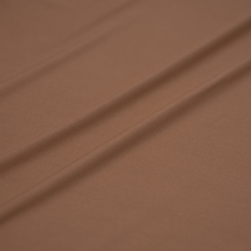 A sample of Breeze Spandex Jersey with Wicking Fabric in the color Fawn 