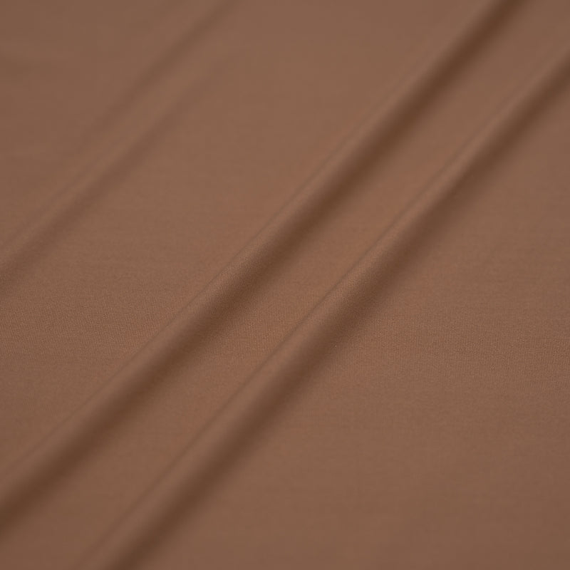 A sample of Breeze Spandex Jersey with Wicking Fabric in the color Fawn