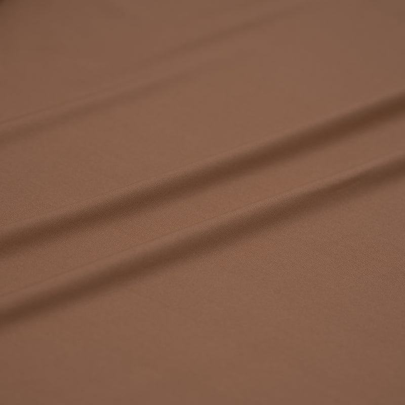 A sample of Breeze Spandex Jersey with Wicking Fabric in the color Fawn