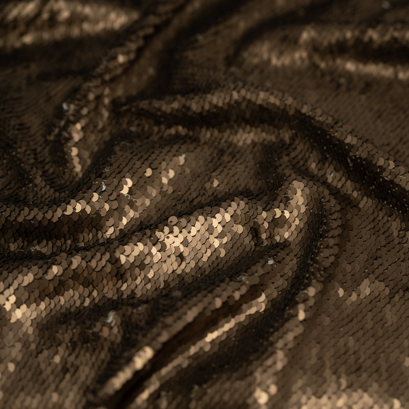A crumpled piece of Brown and Silver Flip Sequin on Spandex