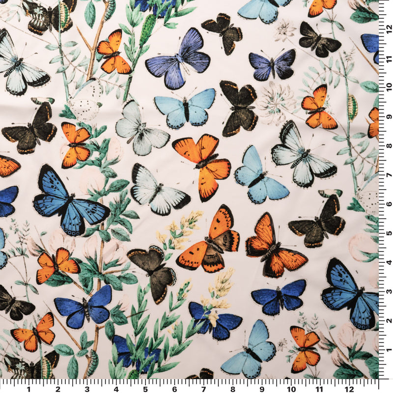 A flat sample of Butterflies in Flight Printed Spandex.