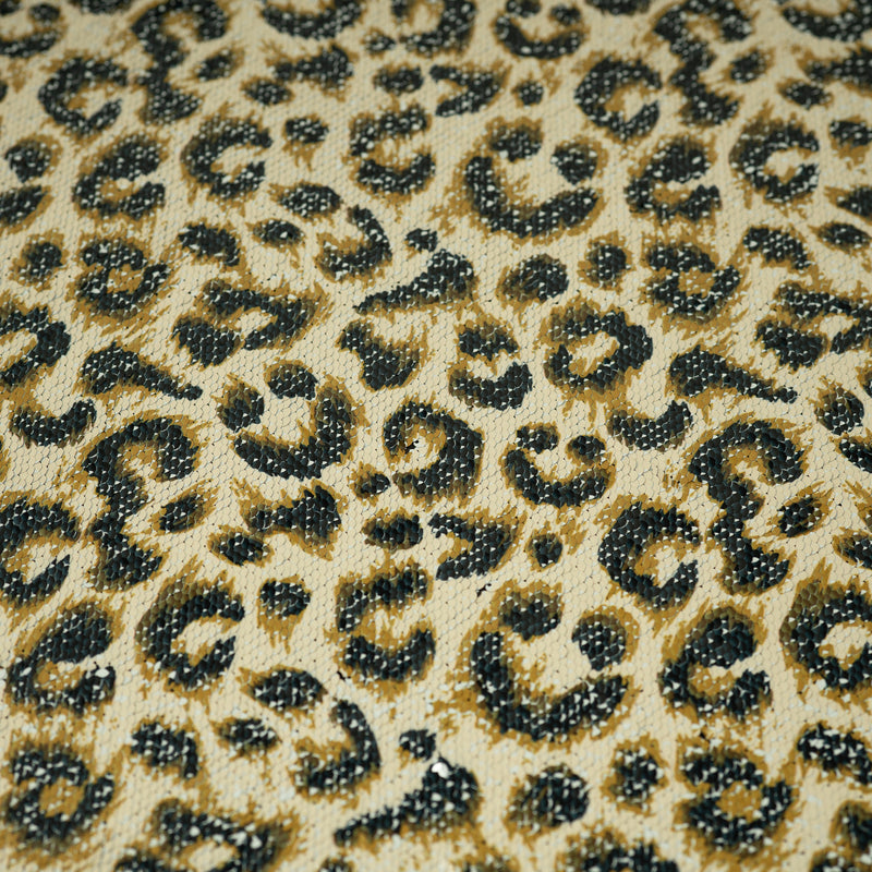 A flat sample of Cheetah Printed Flip Sequin on Spandex