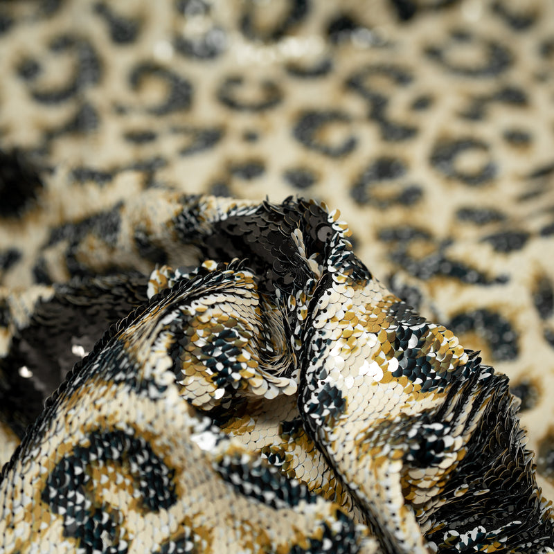 A crumpled piece of Cheetah Printed Flip Sequin on Spandex