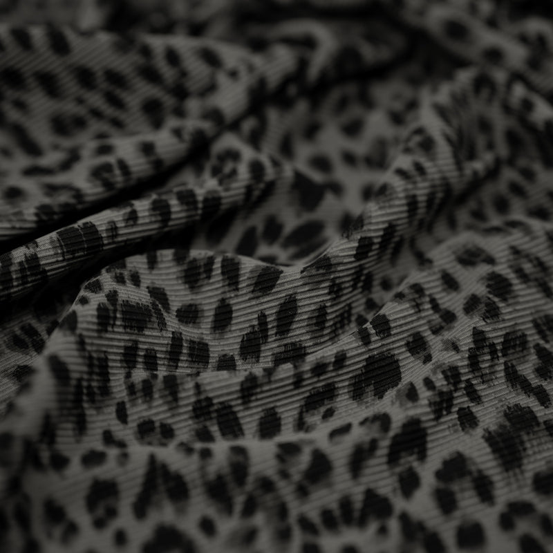 Detailed shot of Cheetah Ribbed Printed Spandex in color Grey
