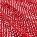 A flat sample of chequered knitted lace sequin in the color red.