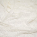 Detailed shot of Cindy Knitted Stretch Lace in White.