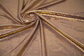 Swirled sample shot of Claudette Creased Foiled Spandex Fabric in color Mauve/Gold.