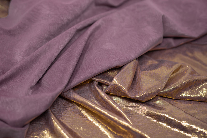 Detailed shot of front and back of Claudette Creased Foiled Spandex Fabric in color Mauve/Gold.