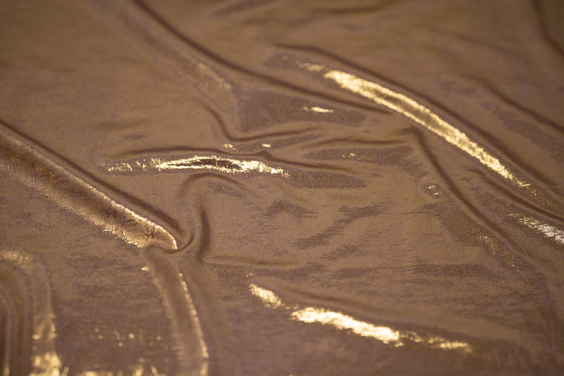 Detailed shot of Claudette Creased Foiled Spandex Fabric in color Mauve/Gold.