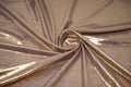 Swirled sample shot of Claudette Creased Foiled Spandex Fabric in color Pale Purple/Gold.