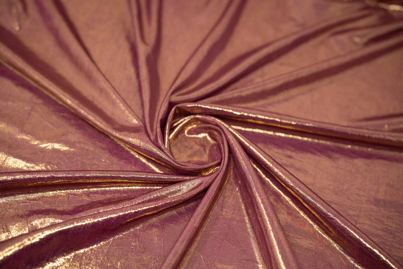 Swirled sample shot of Claudette Creased Foiled Spandex Fabric in color Merlot-Gold