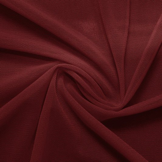 A swirled piece of Compression Mesh in Burgundy