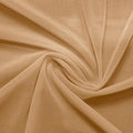 A swirled piece of Compression Mesh in nude.