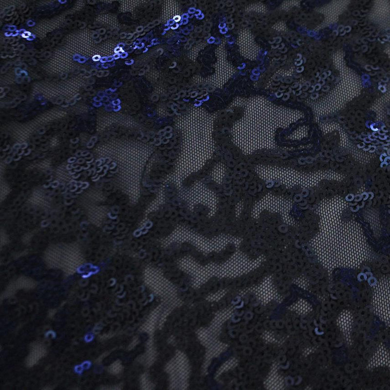 A flat sample of corla reef stretch mesh sequin in the color navy.