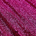 A flat sample of cosmic spandex sequin in the color fuchsia available at blue moon fabrics.