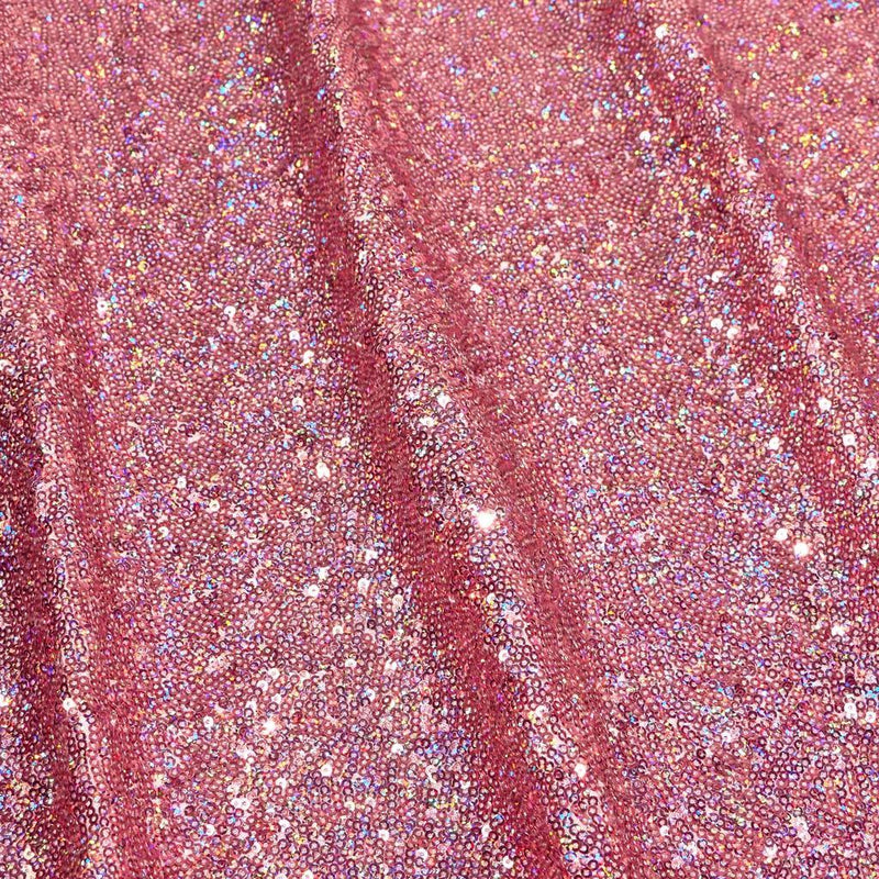 A panel of Cosmic GLOW spandex sequin in dark pink available at Blue Moon Fabrics.