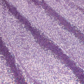 A panel of Cosmic GLOW spandex sequin in lilac available at Blue Moon Fabrics.