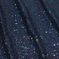 A panel of Cosmic GLOW spandex sequin in navy available at Blue Moon Fabrics.