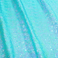 A flat sample of cosmic pearl stretch spandex sequin in the color mint available at blue moon fabrics.