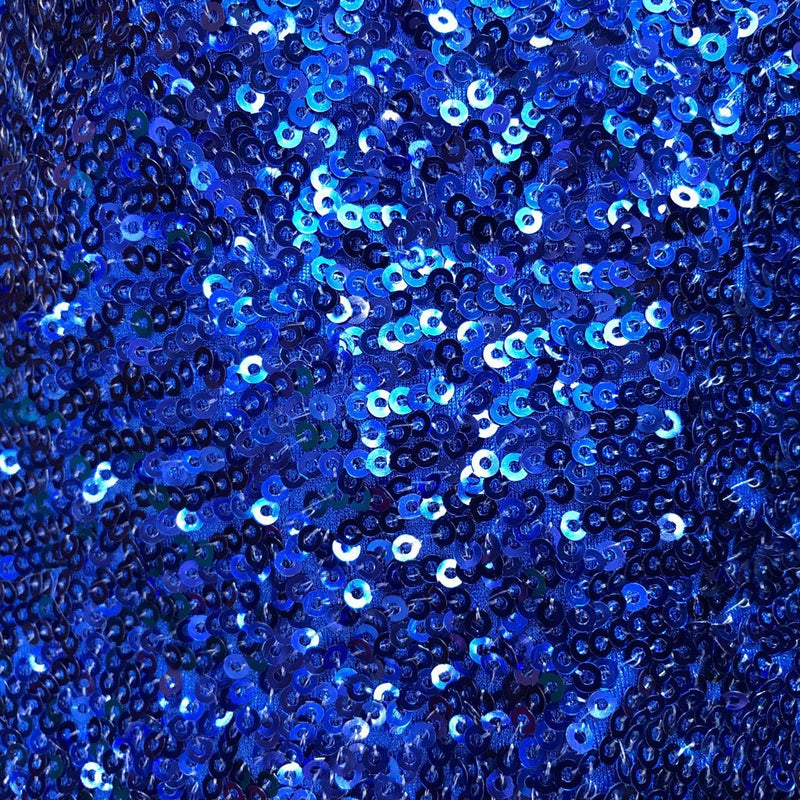 A flat sample of cosmic spandex sequin in the color royal available at blue moon fabrics.