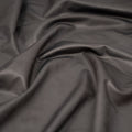 A crumpled piece of Cowboy Faux Leather Foil Printed Spandex in the color Grey  