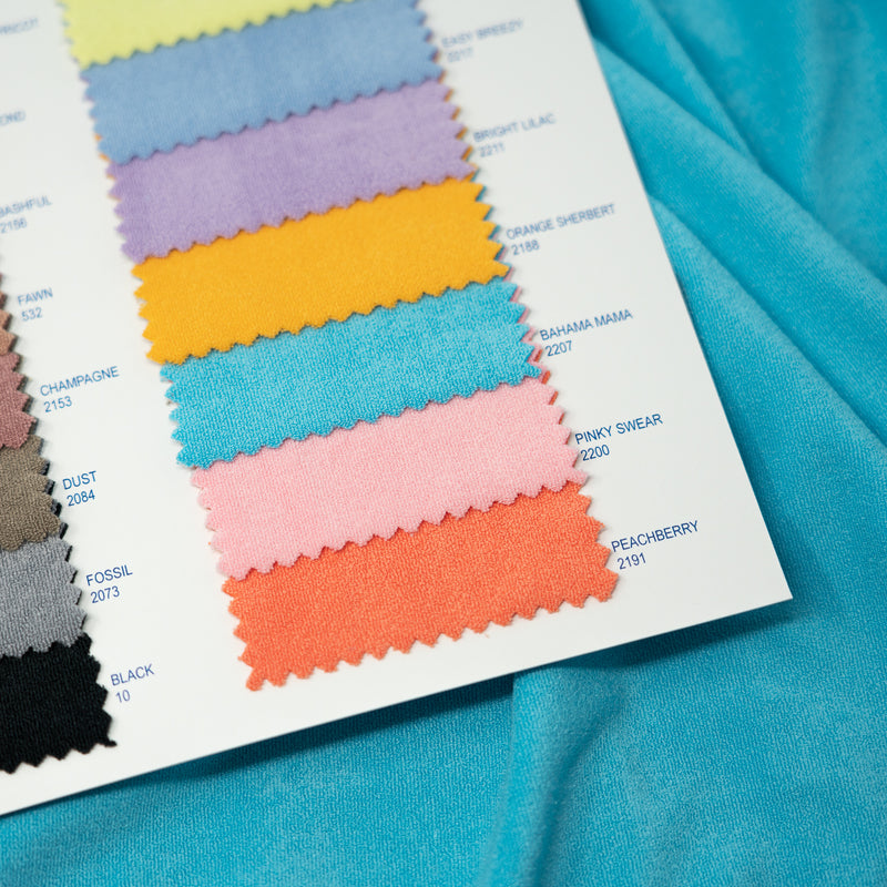 Detailed interior shot of Cozy Color Card book laid over a piece in color Bahama Mama.